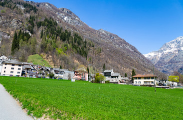Fototapeta na wymiar Rock valley , building and road in mountain of Sonogno in Locarno Ticino Switzerland