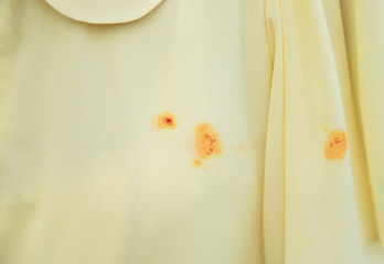 Dirty spicy sauce stain on cloth for cleaning concept 