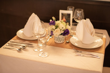 Dinner table setting at a luxury wedding.