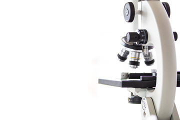 A laboratory microscope for scientific research with white background. Free copy space for text or design.