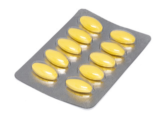 Blister pack full of NSAID drugs pills isolated on white background. Mefenamic acid is member of...