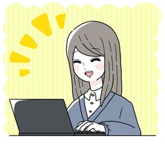 ノートパソコンを操作する女性　ロングヘアー　喜ぶ