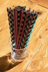 A bunch of multi colored paper straws