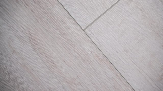 Textures and patterns concept. Detailed close up of bright wooden boards panel floor texture background