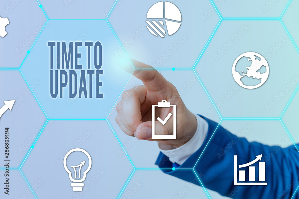 Wall mural conceptual hand writing showing time to update. concept meaning act updating something someone or up