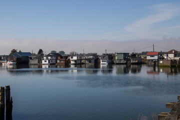 Fototapeta na wymiar A view of a row of houseboats