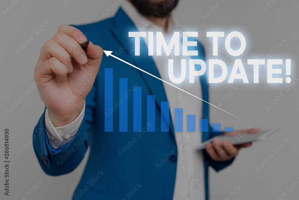 Wall mural writing note showing time to update. business concept for act updating something someone or updated 