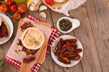 Tigella bread with sun-dried tomatoes. 