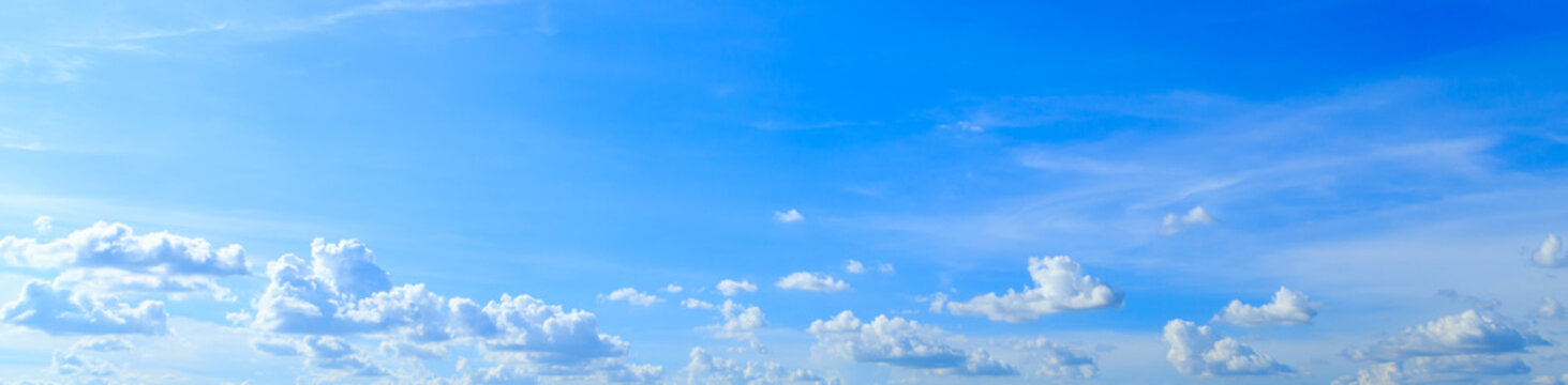 Panorama of blue sky background and white clouds in sunny day