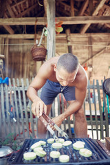 Barbecue making outdoors on a regular / vintage grill.