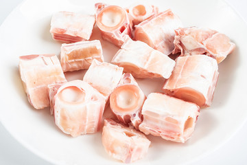 A plate of fresh seafood gourmet shark bones on a white background