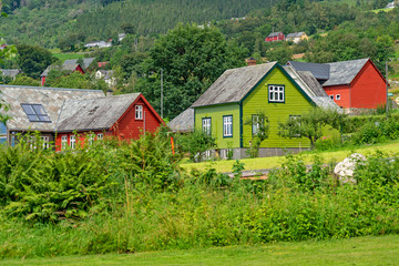 Fototapeta na wymiar Rural houses in Rosendal village in summer, Norway