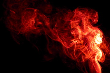 Fototapeta premium Red smoke on black background