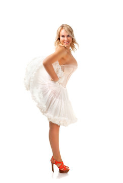 Beautiful sexy model, erotick studio shoot. At white background.