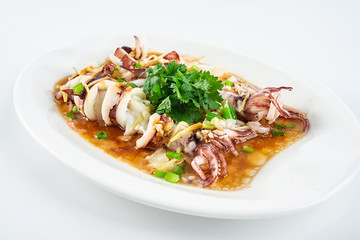 Chinese Cantonese cuisine home cooking, a dish of garlic steamed tubule squid on a white background