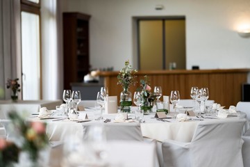  decorated wedding tables with flowers and Menu card