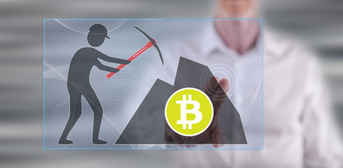 Man touching a bitcoin mining concept