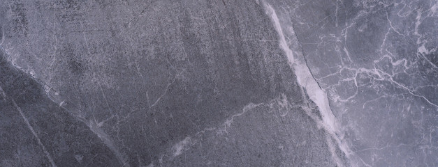 Naklejka premium Gray marble texture. Natural patterned stone for background, copy space and design. Abstract marble stone surface.