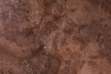 Brown marble texture. Natural patterned stone for background, copy space and design. Abstract marble stone surface.