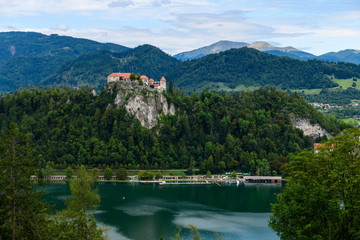 Fototapeta na wymiar Landscape with lake Bled and a medieval castle.