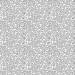 Seamless vector background with random black round elements. Abstract ornament. Dotted abstract pattern