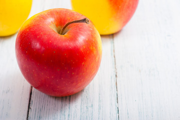 apple fruits on old white wooden table