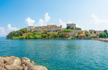 Capodimonte (Italy) - A little old town on Bolsena lake with fortress and suggestive beach and water front; province of Viterbo, Lazio region - obrazy, fototapety, plakaty