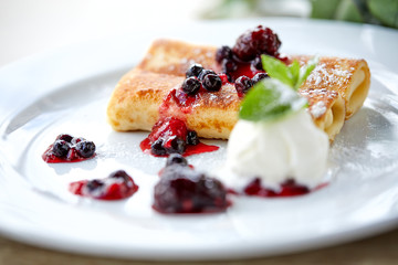 pancakes with berries and ice cream