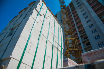 Fototapeta premium Construction of multi-storey residential building