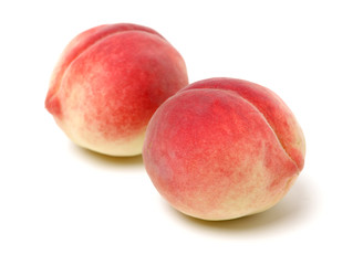 ripe peach on white background 