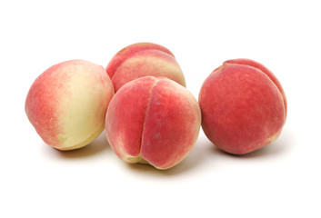 ripe peach on white background 