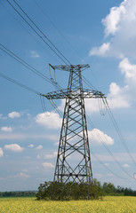 power transmission tower on background of blue sky