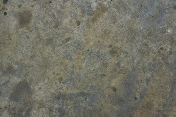 Dirty concrete surface stained with engine oil.Background.