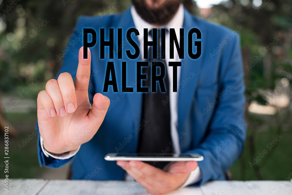 Wall mural Word writing text Phishing Alert. Business photo showcasing aware to fraudulent attempt to obtain sensitive information Businessman with pointing finger in front of him