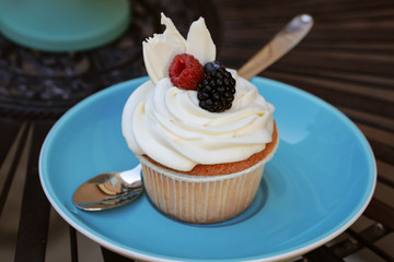 fresh baked cupcake with cream
