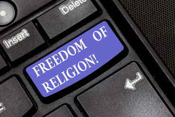 Word writing text Freedom Of Religion. Business concept for right to practise whatever religion one chooses Keyboard key Intention to create computer message pressing keypad idea