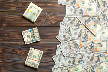 dollars currency on colored background top view, with empty place for your text business money...