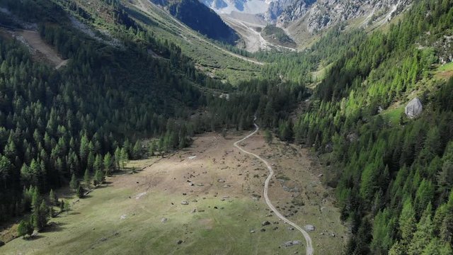 Mountain hiking trail aerial shot - adventure feeling. 4K Drone shot - beautiful wild landscape