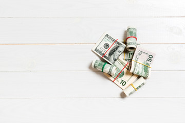 US Dollar bills bundles stack. one hundred dollar bills with stack of money in the middle. Top view of business concept on background with copy space
