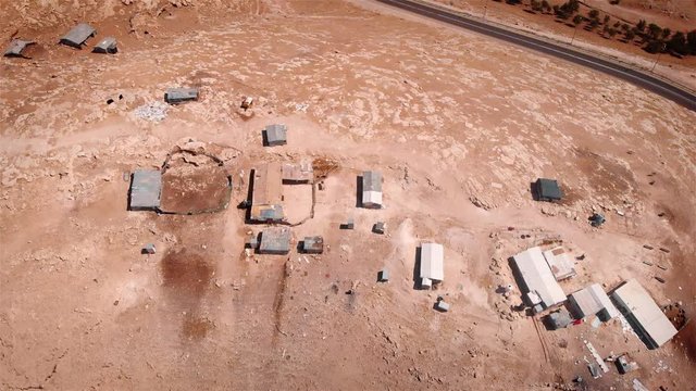 Bedouin Camp Close to Israeli City Maale Adumim Aerial Drone footage over Bedouin outpost Close to Israeli City Maale Adumim Aerial