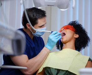 Fototapeta premium Woman patient at dentist's private practice.