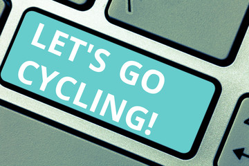 Conceptual hand writing showing Let S Is Go Cycling. Business photo showcasing inviting someone to sport or activity of riding bicycle Keyboard key Intention to create computer message idea
