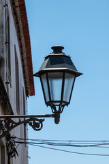 Fototapeta na wymiar Streetlamp - lantern and a blue sky