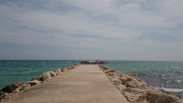 Spring day at mediterranean sea with cloudy sky