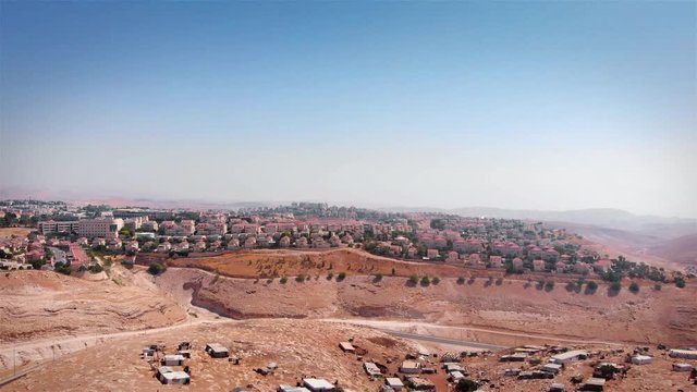 Bedouin Camp Close to Israeli City Maale Adumim Aerial Drone footage over Bedouin outpost Close to Israeli City Maale Adumim Aerial