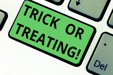 Conceptual hand writing showing Trick Or Treating. Business photo text take part in the custom of trick or treat halloween party Keyboard key Intention to create computer message idea