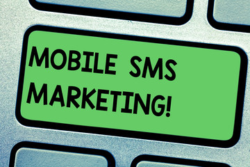 Fototapeta premium Handwriting text writing Mobile Sms Marketing. Concept meaning campaign that interact with your customers via text Keyboard key Intention to create computer message pressing keypad idea