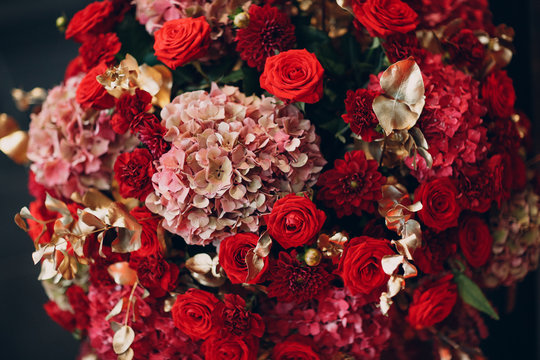 Wedding decor with vase and red flowers roses