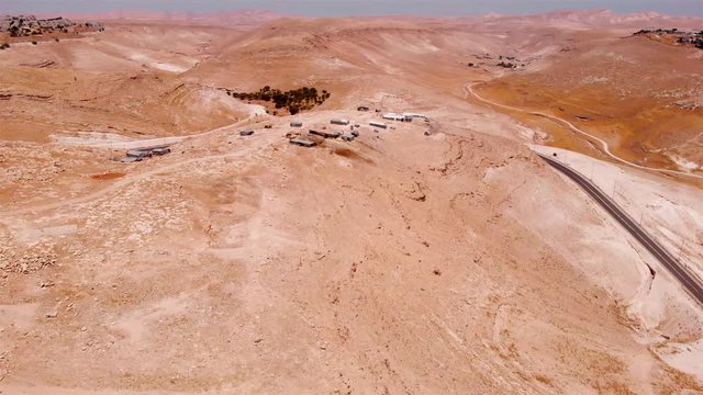 Bedouin outpost in the desert Aerial view Drone footage over Bedouin outpost Close to Israeli City Maale Adumim Aerial