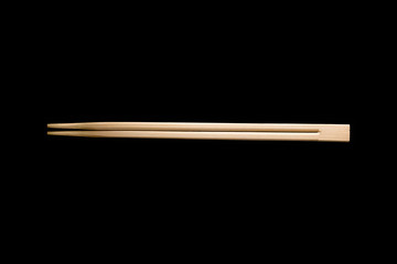 Bamboo Chinese chopsticks on black background